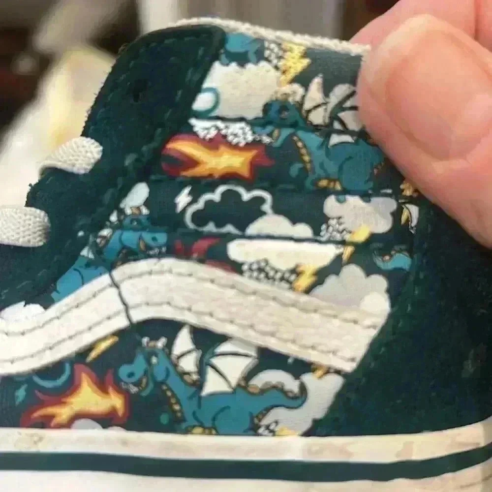 Vans off the wall toddler high tops size 5. In great condition!